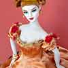 Madra Lord doll wearing Tonner Gone with the Wind Belle Watling outfit